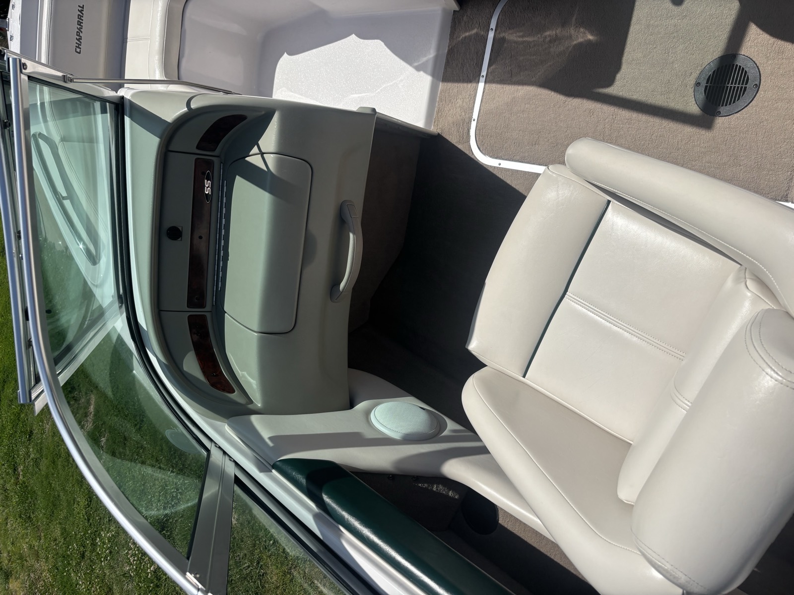 Chaparral boat cabin interior after detail — clean dashboard and helm area